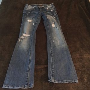 Flared distressed jeans
