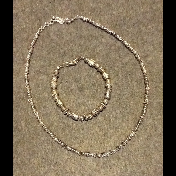 Silver necklace with matching bracelet