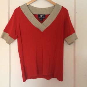 Burnt orange shirt with gold trim