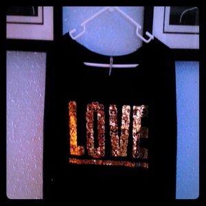 Sleek black long  sleeve  open neck design