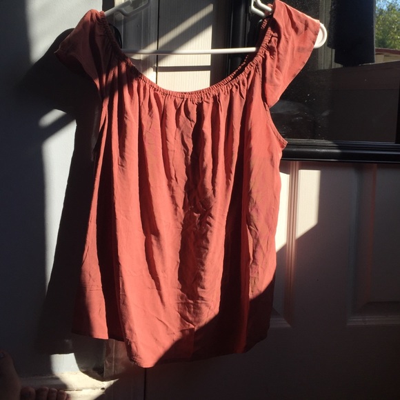 Peachy colored blouse