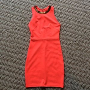 Neon orange dress with detailed back