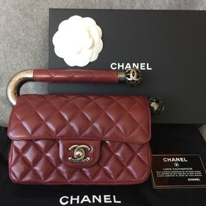 Chanel mini flap bag with unique metal handle