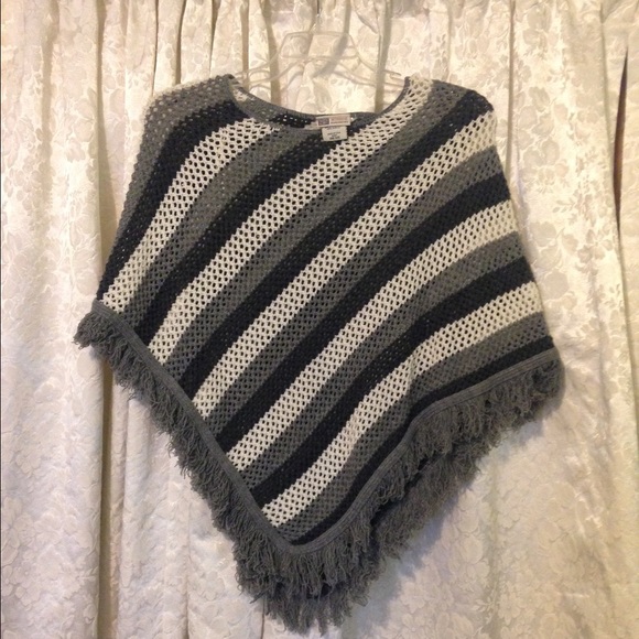 Black, gray, and white poncho