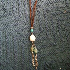Leather, silver, and stones long necklace