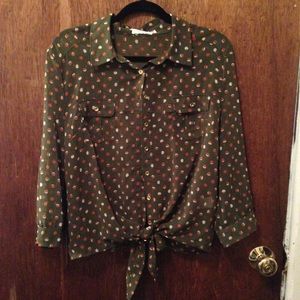 Collard, button up shirt, has a tie on the bottom.