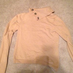 tan turtleneck sweater