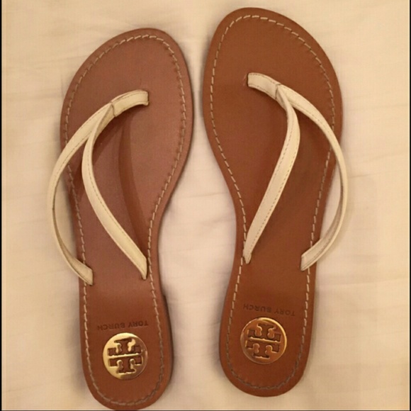 Tory Burch leather thong sandals.