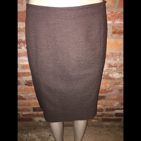 Brown wool skirt w/double back vents.