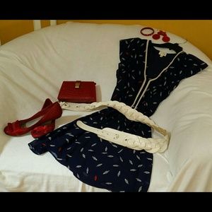 Navy knee length dress.