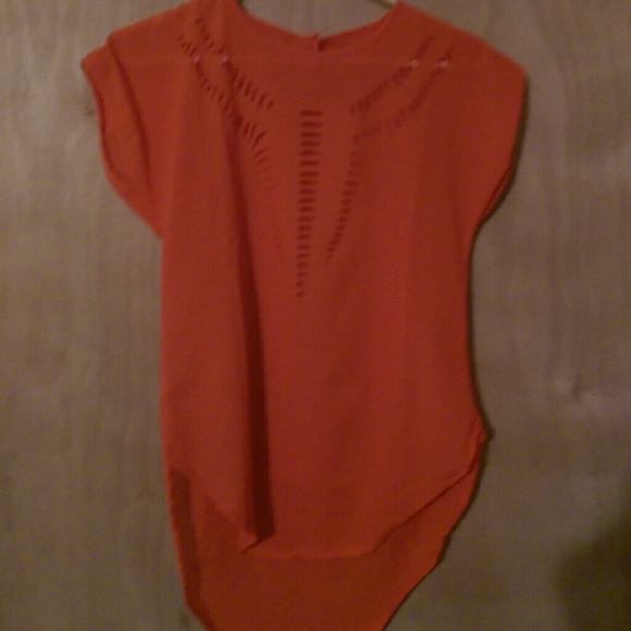 Reddish orange shirt