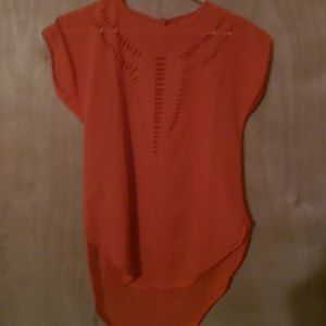 Reddish orange shirt