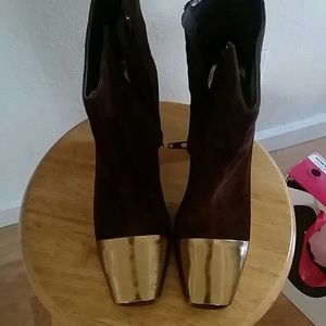 Paris Hilton  suede and leather boots