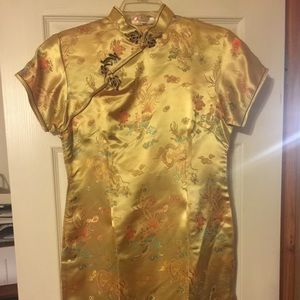 Oriental style dress. Gold