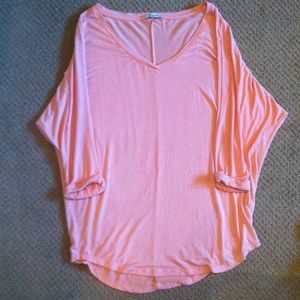 Freebird, size large women's, peach/pink shirt.