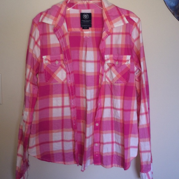 pink, orange, and white American eagle flannel