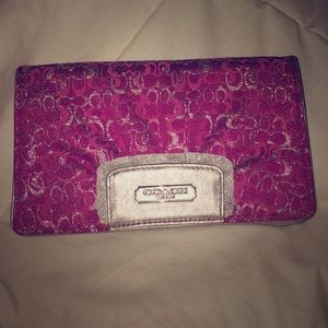 Pink clitter coach clutch