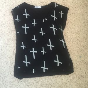 Small cute cross shirt.