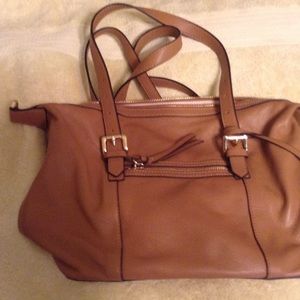 SaksFifth Avenue saddle leather satchel.