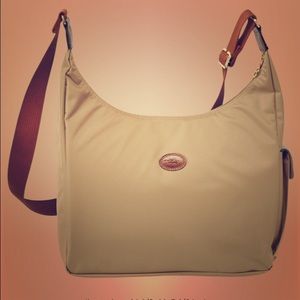 Worn once. New hobo pliage in beige