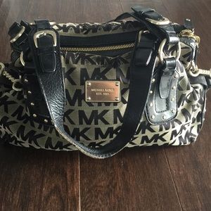 Michael Kors black and gold signature purse