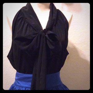 Sleeveless black blouse