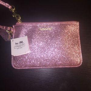 Never used sparkly pink coach wallet