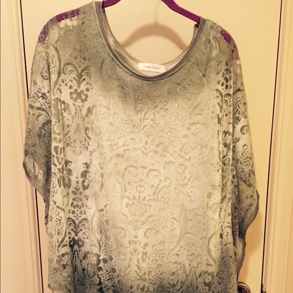 Light weight knit poncho with knit tank attached.