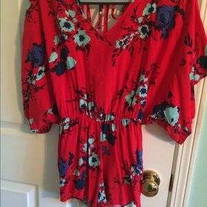 Charlotte Russe red floral romper. Backless