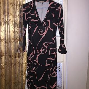 Black dress with pink swirl design