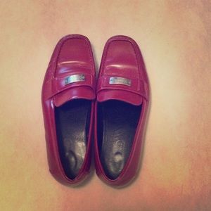 Apple red coach flats