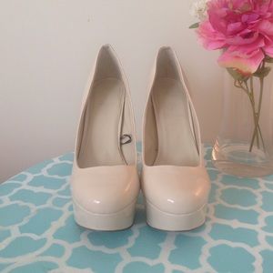 Nude platform heels