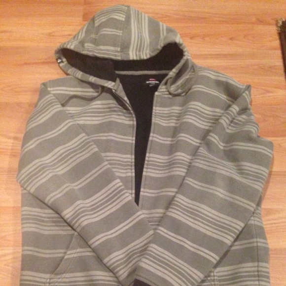 Quiksilver gray stripped sweater. ON HOLD
