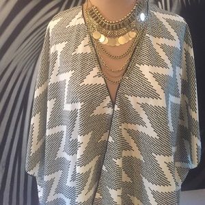 Tribal print poncho / coverall by Painted Threads.