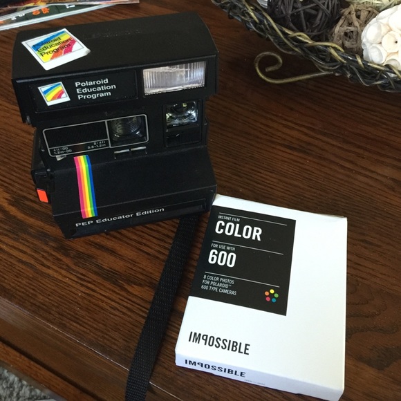 Polaroid camera with film