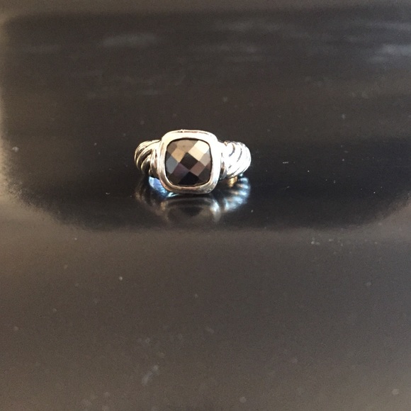 Silver ring with black stone