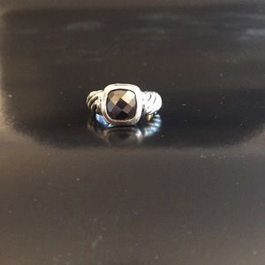 Silver ring with black stone