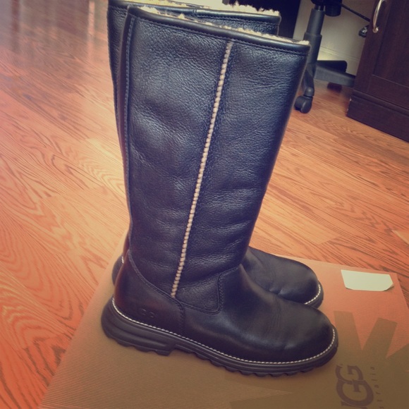 Black leather and white trim uggs