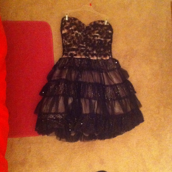 If anyone wants a dress I have one for homecoming - Picture 1 of 3