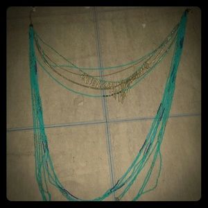 Long beaded turquoise necklace.