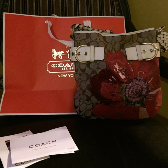 Coach logo with splash of flower