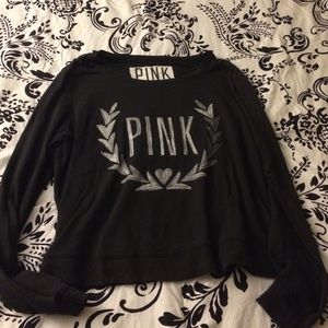 Black pink sweater.