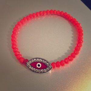 Handmade orange evil eye stretchy bracelet