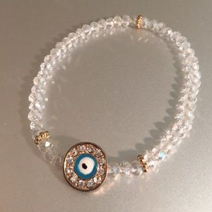 Stretchy evil eye bracelet with clear beading