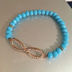 Stretchy infinity bracelet with rhinestones