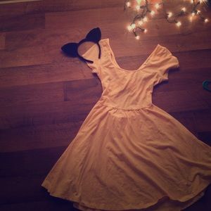 peach flowy dress.