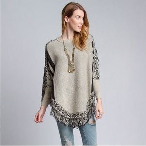 Poncho with sleeves