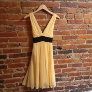 Yellow dress with black satin ribbon tie