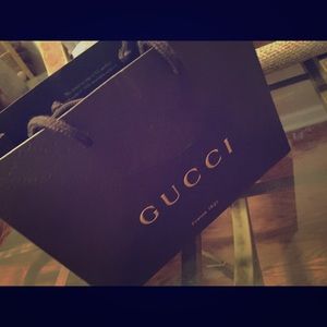 Authentic Gucci shopping bag and ribbon