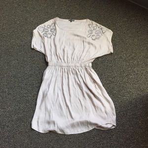 Dress with rhinestone detailing on shoulders